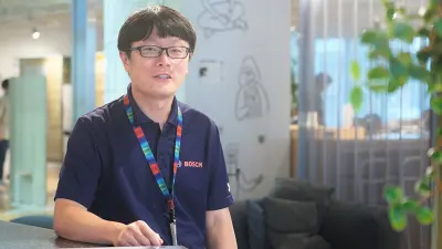 ▲ XC事業部のアドバンスドネットワークソリューション部門に所属するマネージャーの張